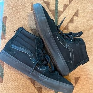 Suede black lined high top Vans